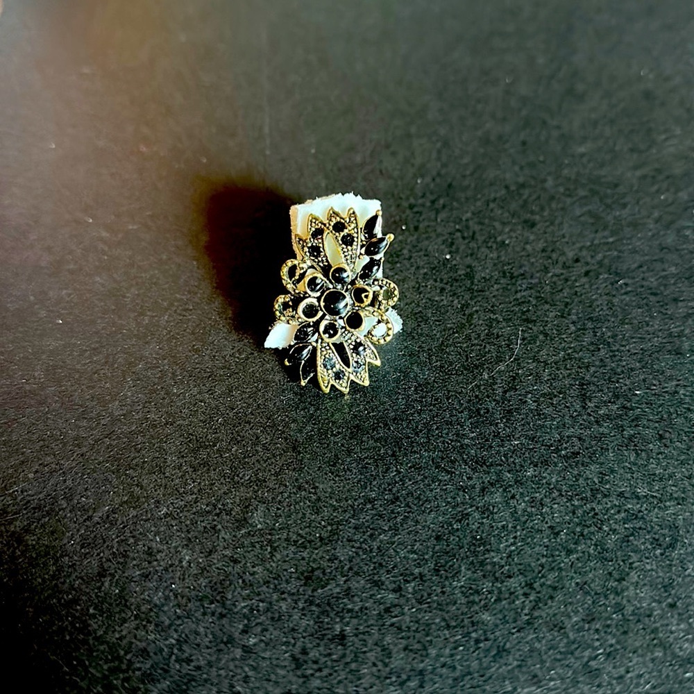 Black and gold ring